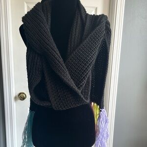 Elegant Black Knit Poncho with Vibrant Fringe